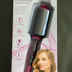 Westinghouse heated voluminzing hair brush.